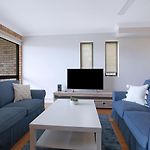 The Poolside Perch - A Breezy Balcony Gem