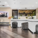 City Escape With Balcony & Resort-Style Amenities