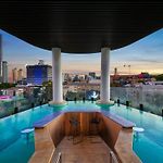 Rooftop Infinity Pool Plus Heated Pool, Gym, Free Parking & More