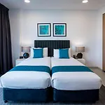 Essence Suites Taringa