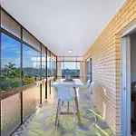 Bright Top-Floor Retreat With City Views