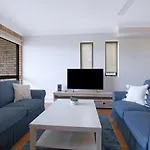 The Poolside Perch - A Breezy Balcony Gem