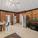 Urban Comfort Cozy And Convenient With A Shared Pool