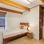 Urban Comfort Cozy And Convenient With A Shared Pool