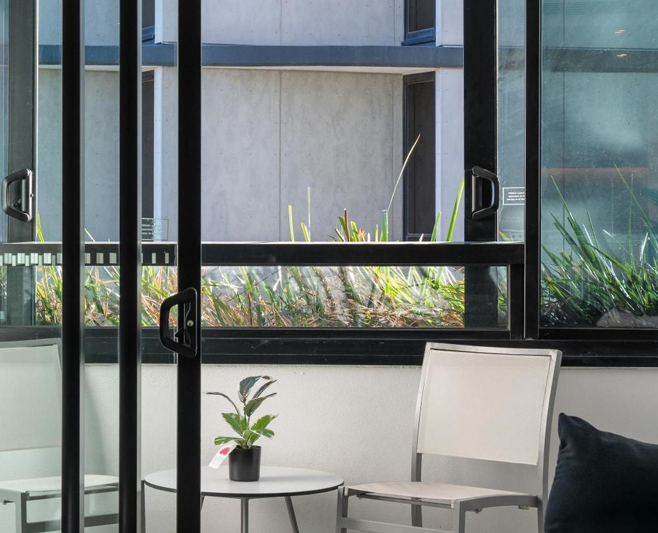 Apartment Escape With Balcony & Resort-style Amenities