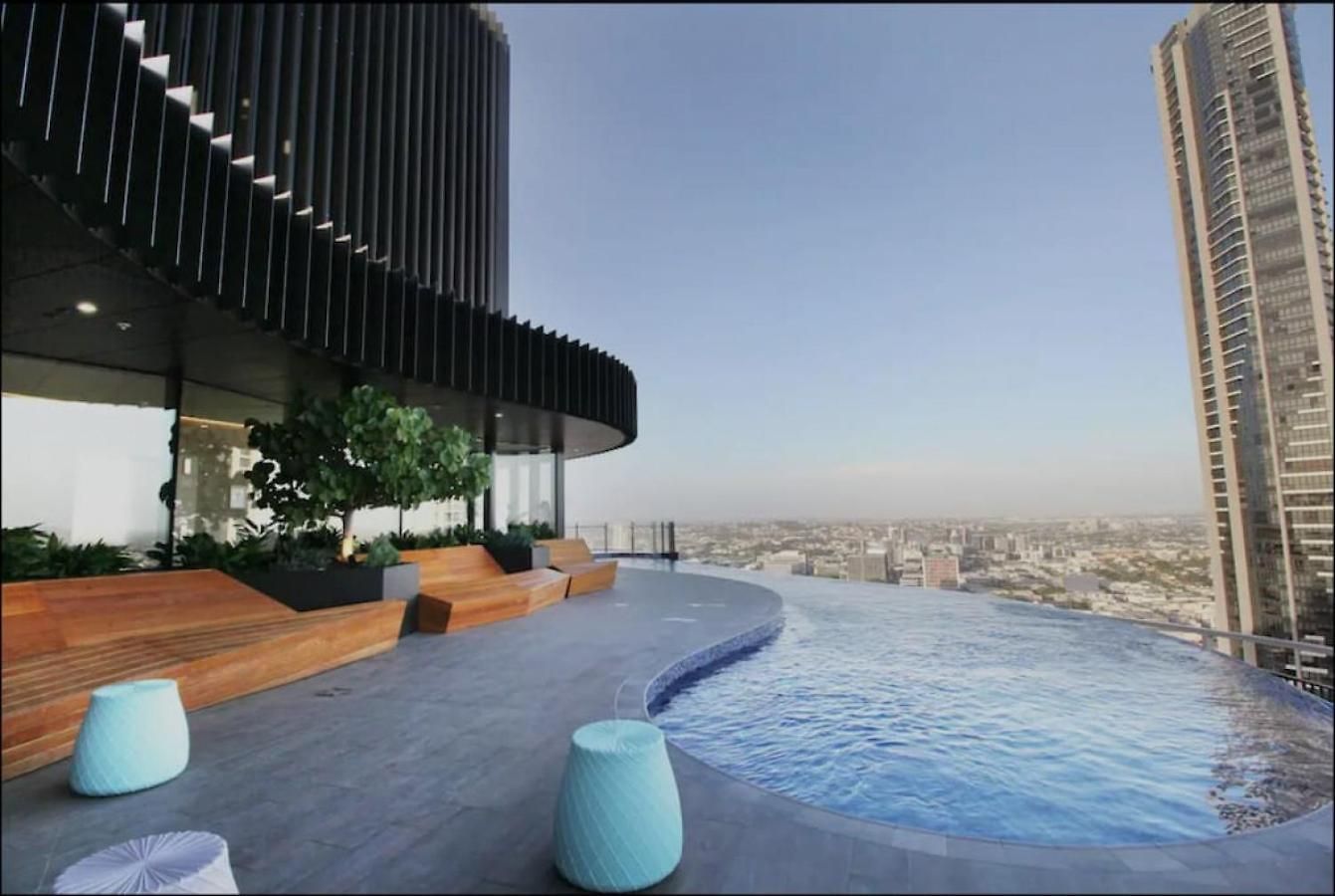 Inspired Serenity With River Views, Fast Wifi, Carpark, Gym, Rooftop Pool *