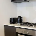 Tranquil River-View 2-Bedroom High-Rise Apartment