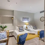 Hamptons Retreat On Level 77 In Skytower