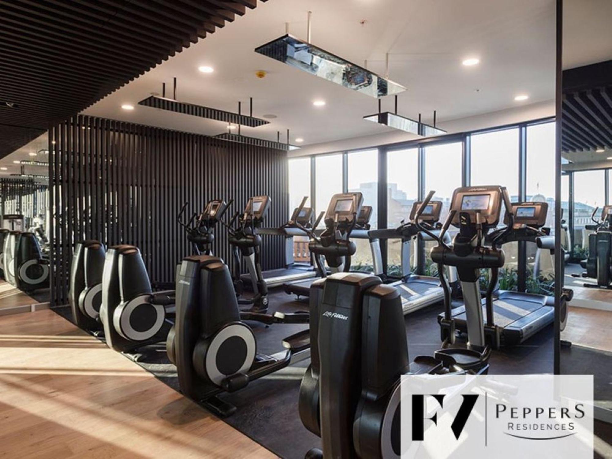 Apartment Escape With Balcony & Resort-style Amenities